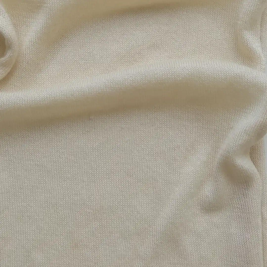 China Yarn for Ladies Vest (Sweater),Men’s Vest (Sweater),Round Neck Pullover (Sweater),Polo T-shirt (Sweater),Kids Crew-Neck Cardigan (Sweater) Worsted Spun Regular Yarn Cotton Lyocell 13-1008TCX Light Beige color buy from China wholesaler bulk order at wholesale price free worldwide shipping Alibaba