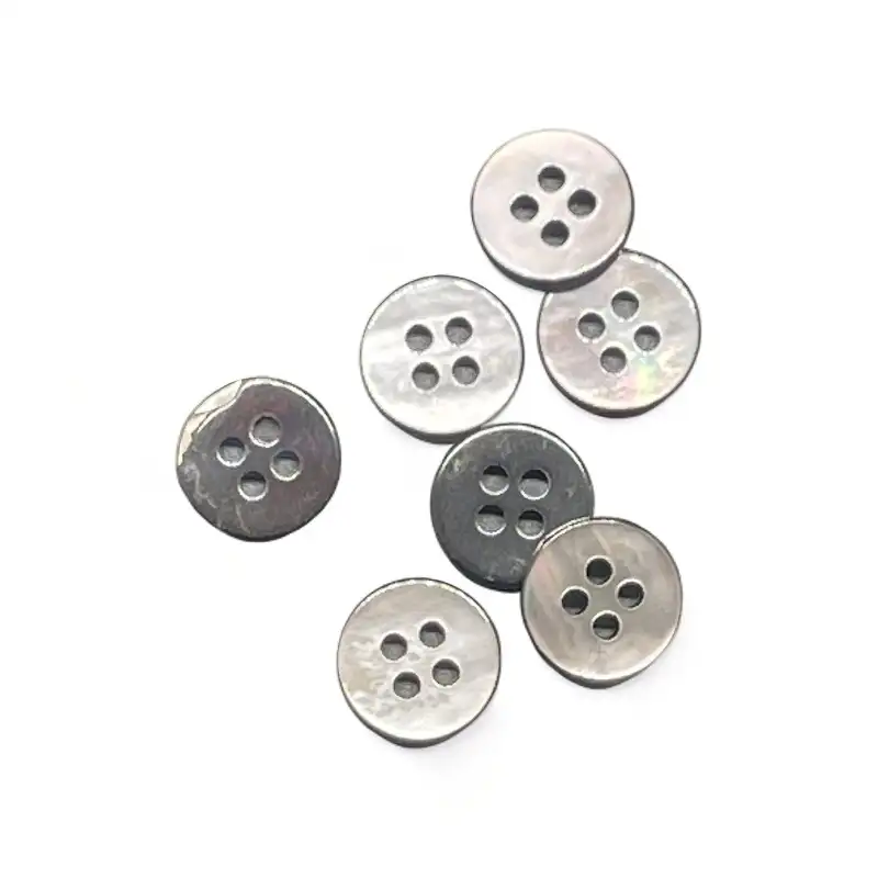 Black 4 holes Shell Button for Shirt,Pants,Denim Jacket,Suit Trouser,Jackets,Blazer,T-Shirt,Polo Shirt,Tank Top,Blouse buy garments accessories in bulk from China wholesaler at wholesale price free worldwide shipping Alibaba