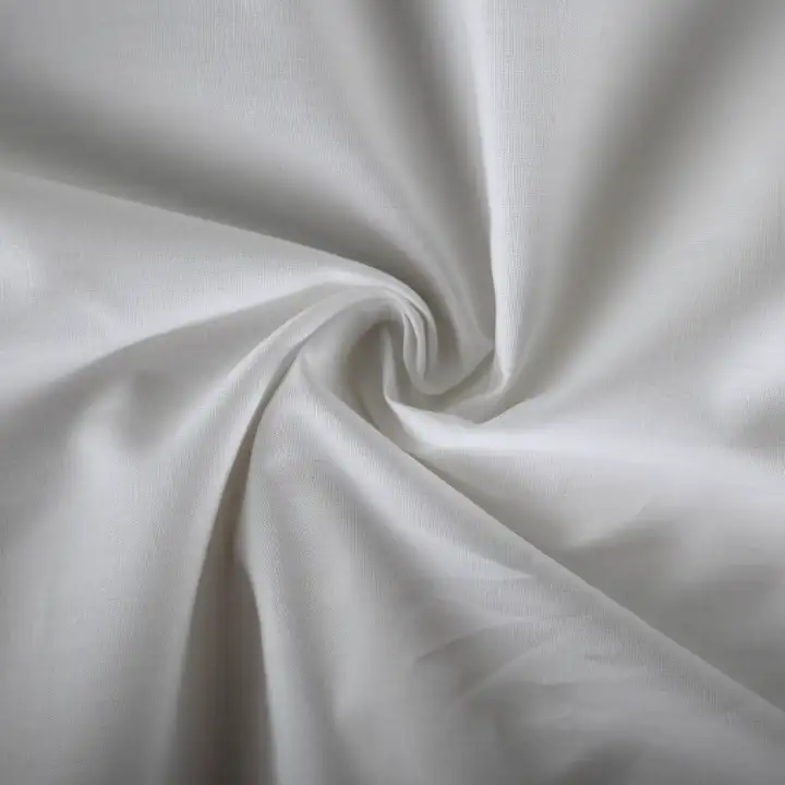 India Fabric for Shirt Cotton Plain Natural Woven Fabric Cotton Off White color buy from India wholesaler bulk order at wholesale price free worldwide shipping Alibaba