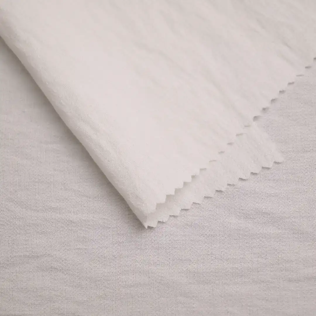 China Fabric for Blouse,Skirt,Shirt Long Sleeve Button ,Over Shirt Nylon/Rayon Bengaline Woven Blended Fabric Rayon Nylon White color buy from China wholesaler bulk order at wholesale price free worldwide shipping Alibaba