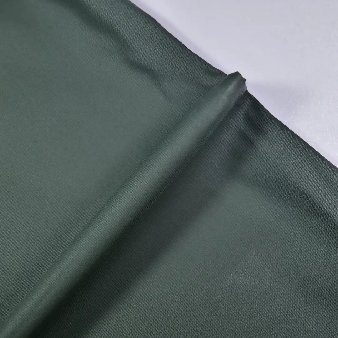 China Fabric for Trench Coat Oxford Synthetic Woven Fabric Polyester dark green color buy from China wholesaler bulk order at wholesale price free worldwide shipping Alibaba