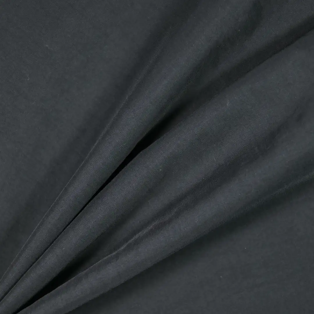 China Fabric for Shirt,Jackets,Trench Coat Nylon/Cotton Plain Woven Blended Fabric Nylon Compact Organic Cotton BLACK color buy from China wholesaler bulk order at wholesale price free worldwide shipping Alibaba