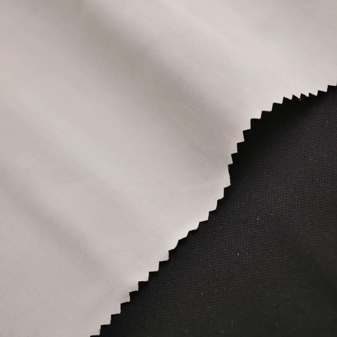China Fabric for Shirt,Blouse,Lingerie,Shirt Long Sleeve Button  Polyester/Rayon Plain Woven Blended Fabric Polyester Modal Solid- Cream color buy from China wholesaler bulk order at wholesale price free worldwide shipping Alibaba