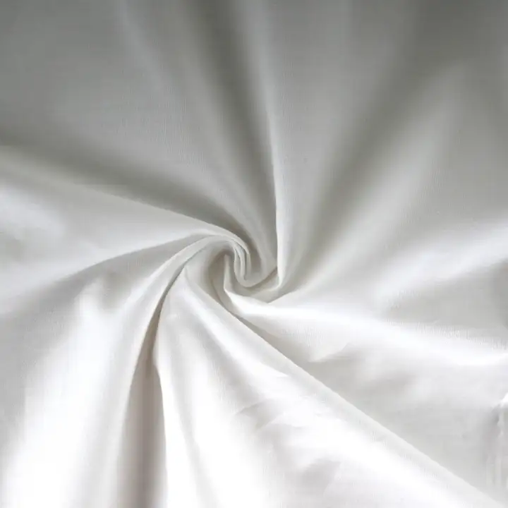 India Fabric for Shirt Cotton Plain Natural Woven Fabric Cotton Off White color buy from India wholesaler bulk order at wholesale price free worldwide shipping Alibaba