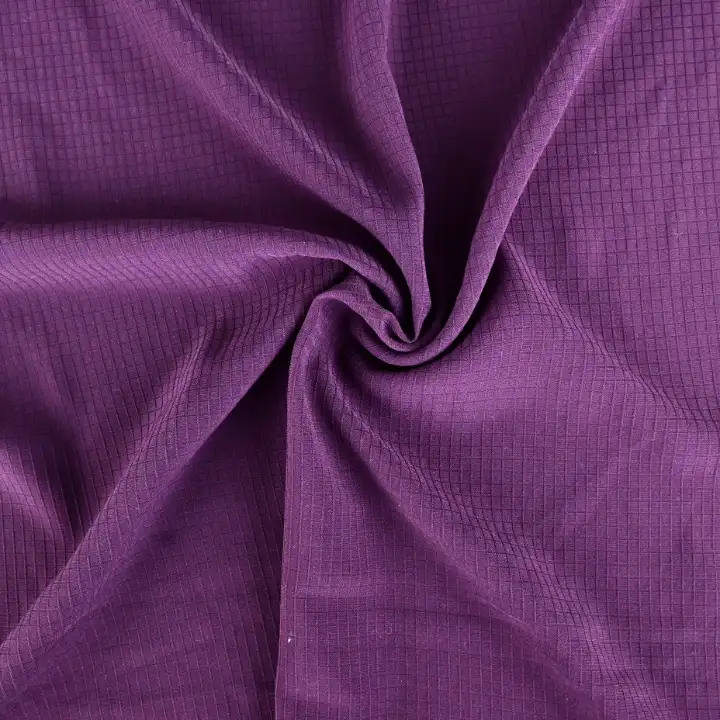 India Fabric for Blouse Poly Bubble Check Synthetic Woven Fabric Polyester Spandex Burgundy color buy from India wholesaler bulk order at wholesale price free worldwide shipping Alibaba