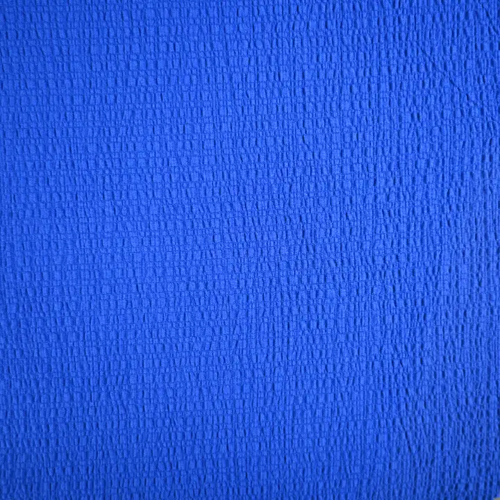 India Fabric for Blouse Polyester Crinkle Fabric Synthetic Woven Fabric Polyester Spandex Blue color buy from India wholesaler bulk order at wholesale price free worldwide shipping Alibaba