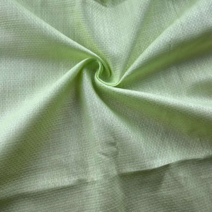 India Fabric for Shirt Cotton Dobby Natural Woven Fabric COTTON Light Green color buy from India wholesaler bulk order at wholesale price free worldwide shipping Alibaba
