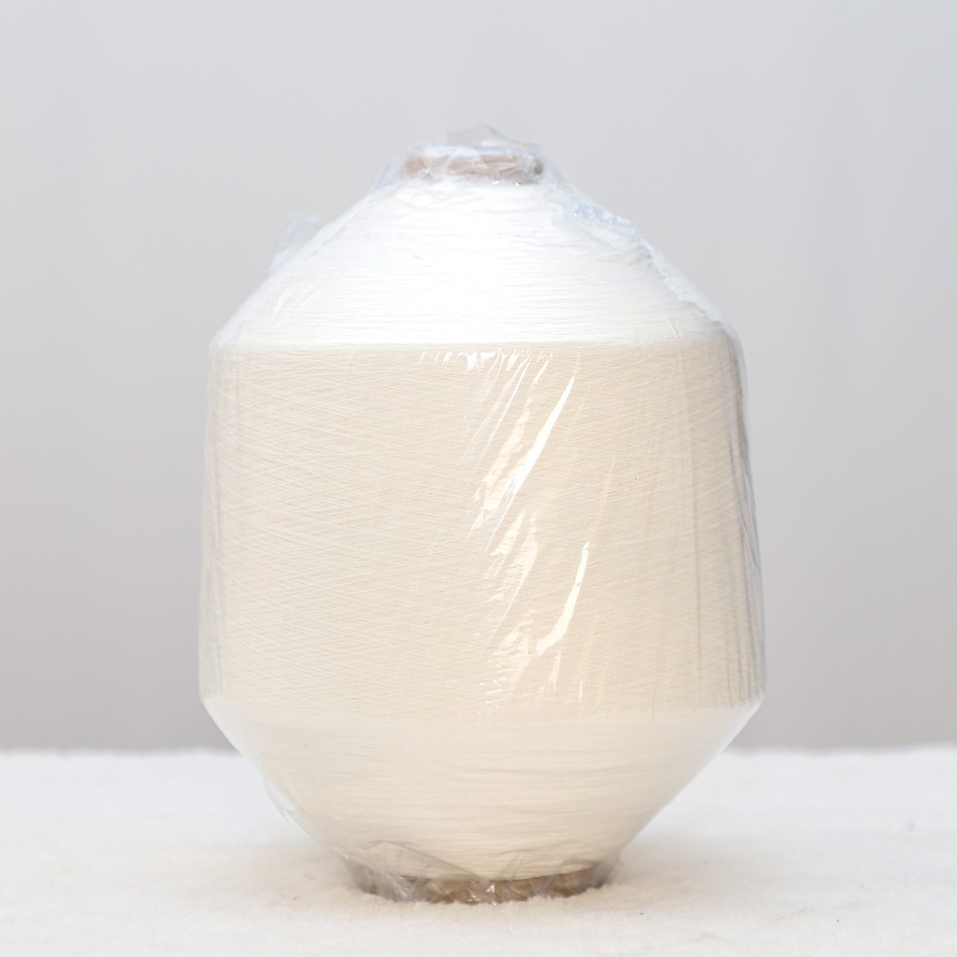 China Yarn for Shirt Long Sleeve Button (Sweater),Crew Neck Pullover (Sweater),Polo T-shirt (Sweater) Double Twist Spun Regular Yarn Livaeco Nylon Ivory color buy from China wholesaler bulk order at wholesale price free worldwide shipping Alibaba