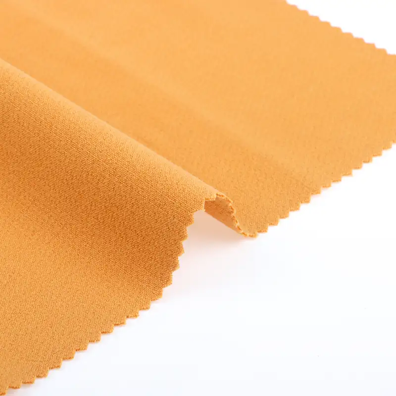 China Fabric for Pants Polyester/Rayon Plain Woven Blended Fabric Polyester Rayon Spandex Orange color buy from China wholesaler bulk order at wholesale price free worldwide shipping Alibaba