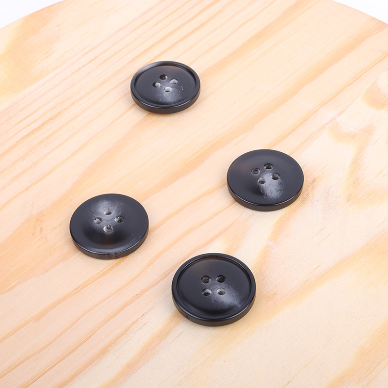 Black 4 holes Resin Button for Denim Jackets,Jackets,Blazer,Trench Coat,Down Jacket,Overcoat,Suit buy garments accessories in bulk from China wholesaler at wholesale price free worldwide shipping Alibaba