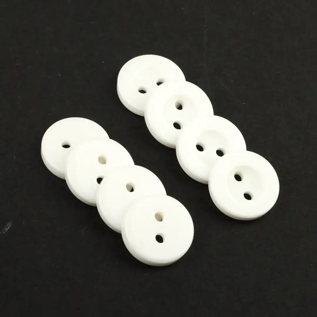 White 2 holes Plastic Button for Shirt,Pants,Denim Jacket,Suit Trouser,Jackets,Blazer,T-Shirt,Polo Shirt,Tank Top,Blouse buy garments accessories in bulk from China wholesaler at wholesale price free worldwide shipping Alibaba