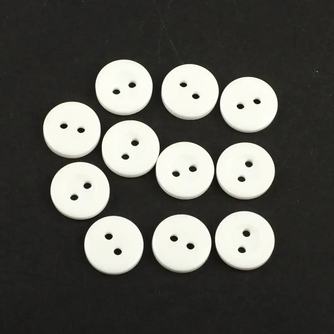 White 2 holes Plastic Button for Shirt,Pants,Denim Jacket,Suit Trouser,Jackets,Blazer,T-Shirt,Polo Shirt,Tank Top,Blouse buy garments accessories in bulk from China wholesaler at wholesale price free worldwide shipping Alibaba