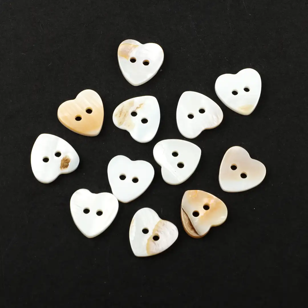 White 2 holes Shell Button for T-Shirt buy garments accessories in bulk from China wholesaler at wholesale price free worldwide shipping Alibaba