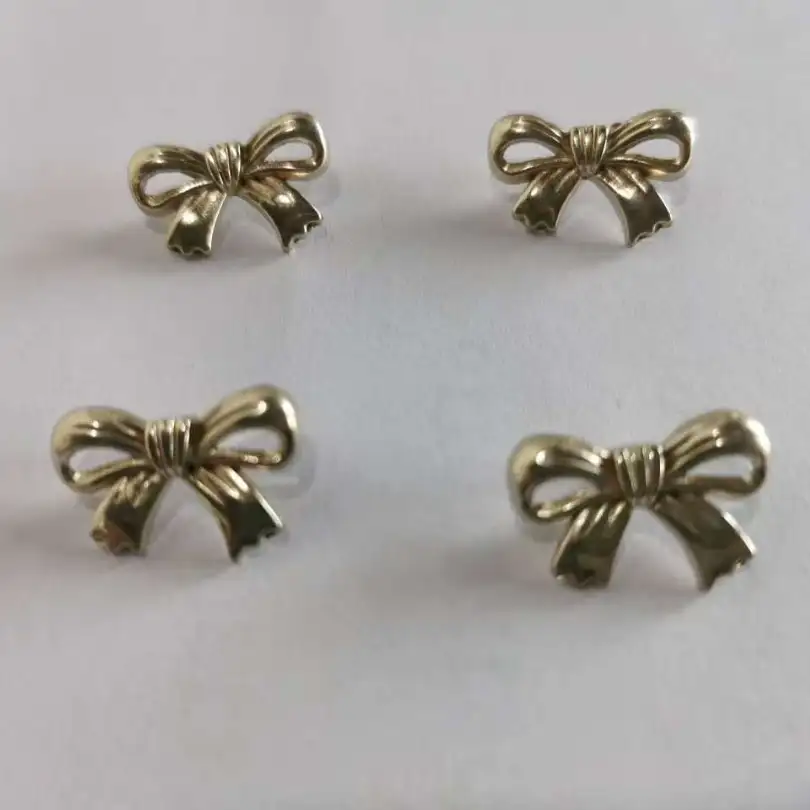 golden 1 holes Metal Button for Blouse buy garments accessories in bulk from China wholesaler at wholesale price free worldwide shipping Alibaba